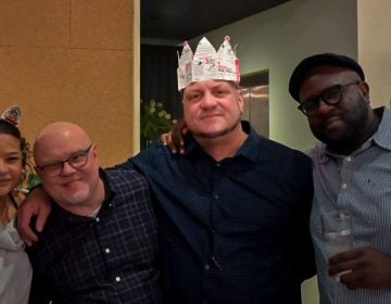 Rosado (center, with crown) surrounded by colleagues at his goodbye party (Facebook/ Prevention Point)