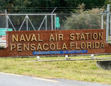 A gunman killed three people and injured eight others at Pensacola Naval Air Station on Friday. It was the second shooting on a U.S. Naval Base in a week. (Josh Brasted/Getty Images)