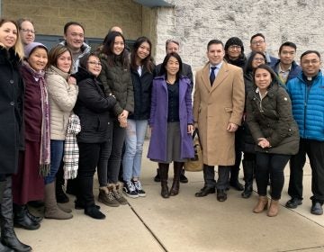  City Councilmember Helen Gym (middle) stands next to the Sukwanputra daughters and their family attorney Chris Casazza. They are surrounded by friends and family who traveled to York, Pa., to show their support at the hearing. (Dale Mezzacappa/The Notebook) 