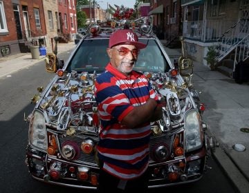 Philadelphian Gilbert Hilton has decorated his car with thousands of dollars worth of household items. (Tim Tai/ The Philadelphia Inquirer)