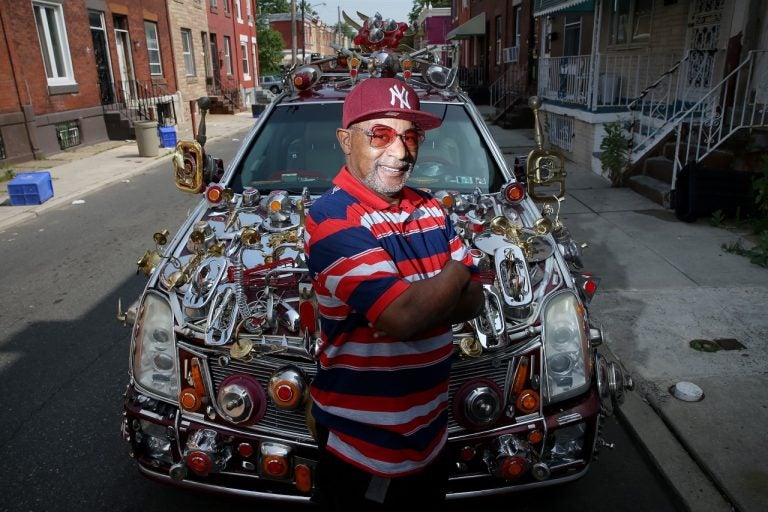 Philadelphian Gilbert Hilton has decorated his car with thousands of dollars worth of household items. (Tim Tai/ The Philadelphia Inquirer)