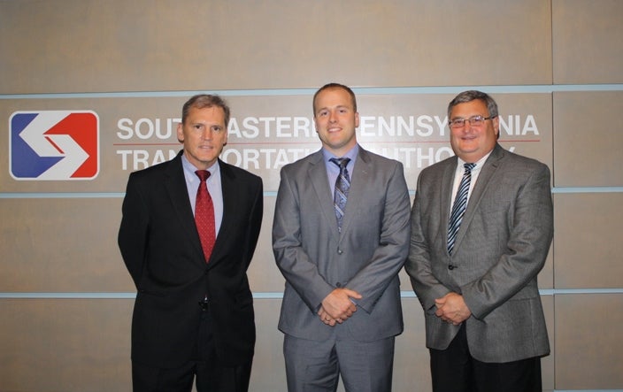 Bob Lund (left), Alex Reiner (center) and General Manager Joe Casey (right) pause for a photo after a 2014 board meeting. (SEPTA)