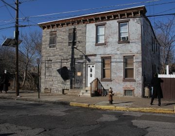 Martin Luther King Jr. stayed in the back bedroom of this house (left) on Walnut Street in Camden, according to the owner who inherited the property from her father-in-law. (Emma Lee/WHYY)