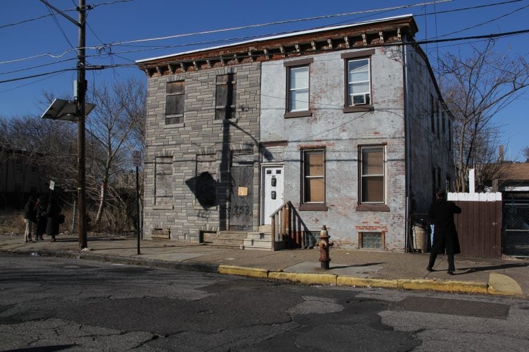 Martin Luther King Jr. stayed in the back bedroom of this house (left) on Walnut Street in Camden, according to the owner who inherited the property from her father-in-law. (Emma Lee/WHYY)