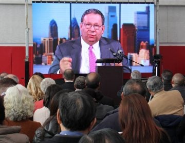 Comcast's David L. Cohen delivers a video address to the crowd at the grand opening of the Crane Chinatown community center on Nov. 8, 2019. Comcast was a major donor to the project. (Emma Lee/WHYY)