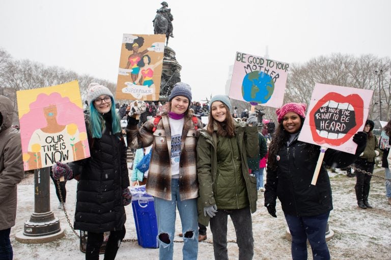 Downingtown East High School students Chloe Baumann, Hope Hessler, Megan Beale, and Gabbi Chacko traveled to Philadelphia to attend the Women's March. (Becca Haydu for WHYY)