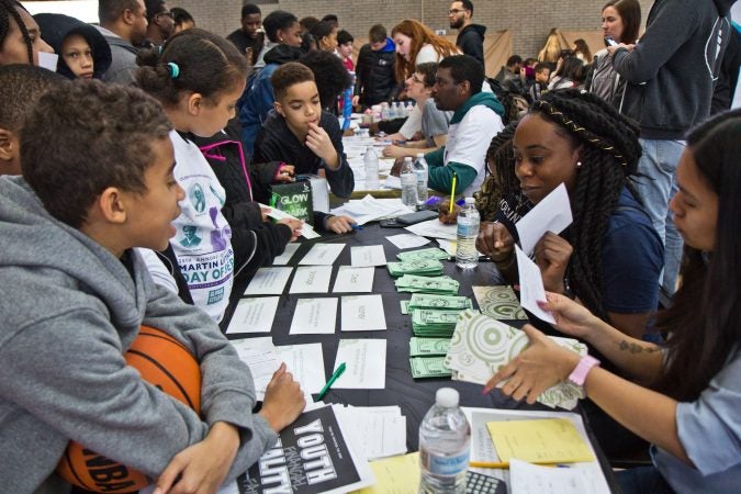 Kids ages 8 through 13 participated in the Youth Financial Reality Fair. (Kimberly Paynter/WHYY)