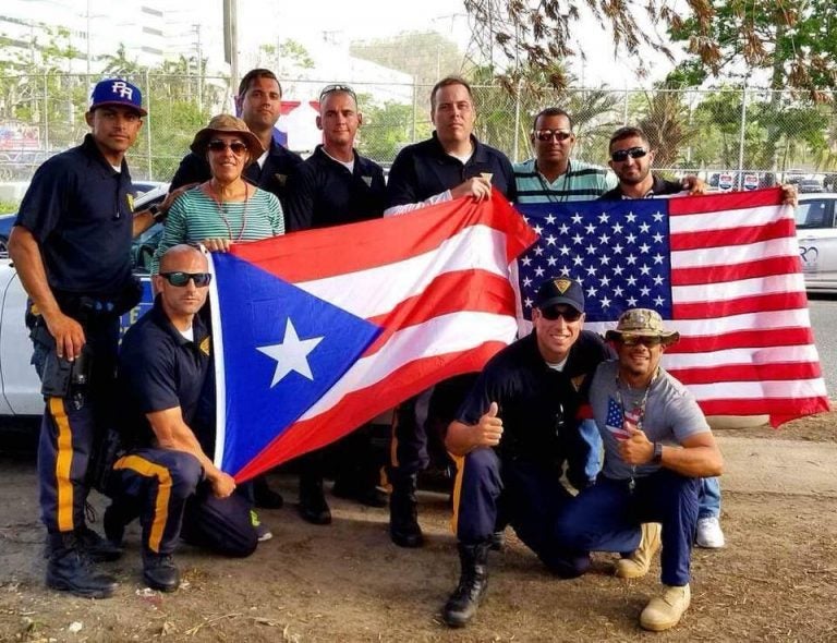 In this New Jersey State Police image from October 2017, New Jersey state troopers pose for a picture in Puerto Rico during a deployment after Hurricane Maria. 