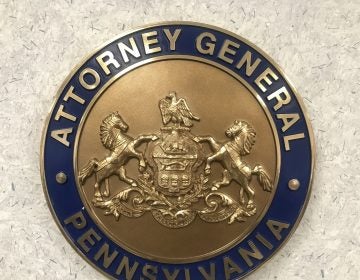 The Pa. attorney general's office seal is posted at the Safe2Say Something crisis center Jan. 13, 2020. (Brett Sholtis/WITF)