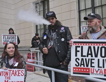 In this Jan. 13, 2020, file photo, Matthew Elliot, center, and other supporters of flavored vaping products protest at the state house in Trenton, N.J. (Seth Wenig/AP Photo)