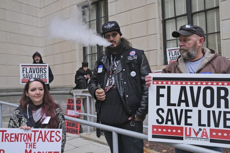 In this Jan. 13, 2020, file photo, Matthew Elliot, center, and other supporters of flavored vaping products protest at the state house in Trenton, N.J. (Seth Wenig/AP Photo)