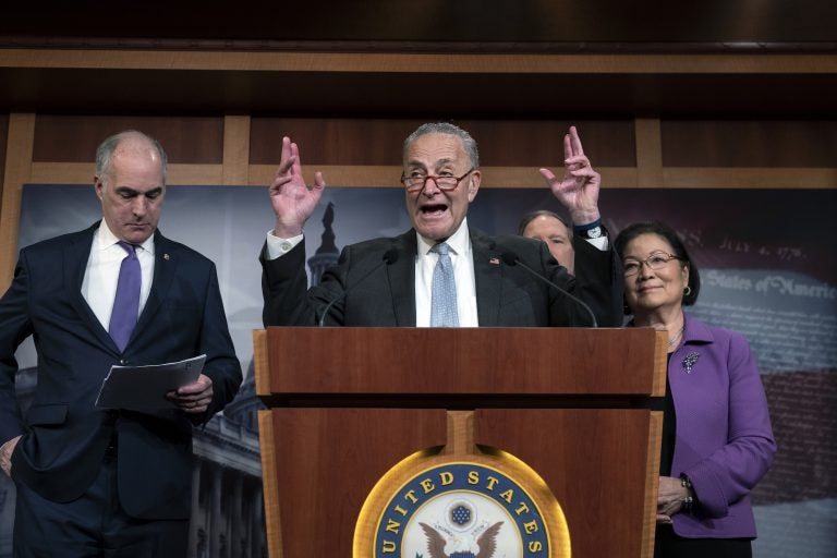 Senate Minority Leader Chuck Schumer, D-N.Y., joined from left by Sen. Bob Casey, D-Pa., Sen. Tom Udall, D-N.M., and Sen. Mazie Hirono, D-Hawaii, speaks to reporters about progress in the impeachment trial of President Donald Trump on charges of abuse of power and obstruction of Congress, at the Capitol in Washington, Thursday, Jan. 23, 2020. (AP Photo/J. Scott Applewhite)