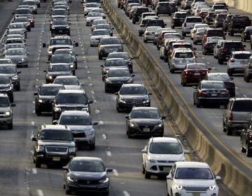 In this April 10, 2019, file photo, rush-hour traffic heads east, left, and west, right, along the Schuylkill Expressway in Philadelphia.  (Jacqueline Larma/AP Photo)