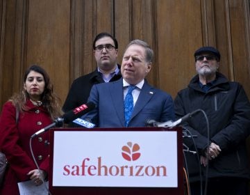 U.S. Attorney Geoffrey Berman, standing with victims of childhood sexual abuse, speaks at an event held by Safe Horizon, a non-profit victim services agency, in front of Jeffrey Epstein's Manhattan residence as they raise awareness for New York State's Child Services Act,  Monday, Jan. 27, 2020, in New York. (Craig Ruttle/AP Photo)