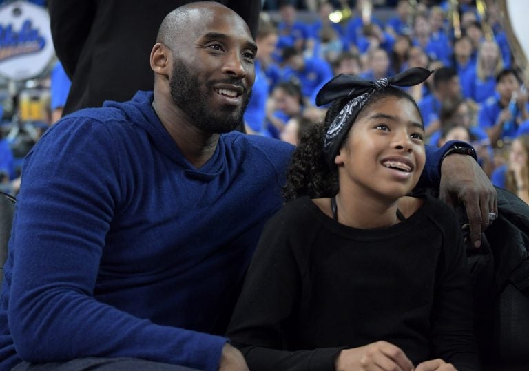 Kobe Bryant, the Los Angeles Lakers superstar with daughter Gianna Maria-Onore Bryant during an NCAA women's basketball game. Both of them died Sunday morning in a helicopter crash. (Kirby Lee via AP Photo)