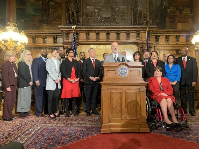 Wolf, Democratic lawmakers and state secretaries gather to call for toxin abatement funding. (Katie Meyer/WITF)