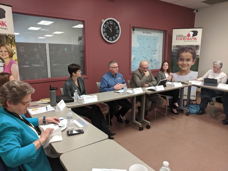 Executive Director of the Central Pennsylvania Food Bank Joe Arthur (center) speaks during a roundtable discussion on proposed cuts to the Supplemental Nutrition Assistance Program (SNAP) in Harrisburg on Monday, Jan. 13, 2020. (Rachel McDevitt/WITF)