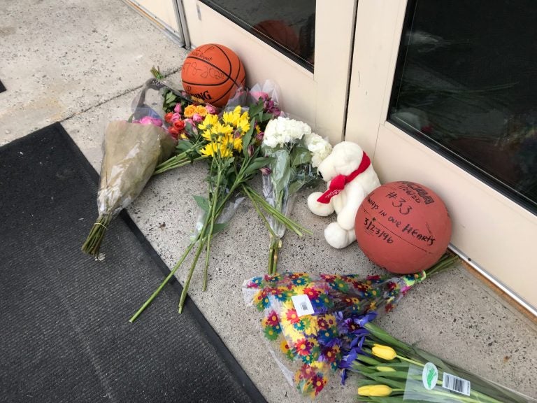Fans pay tribute in memory of Kobe Bryant at Lower Merion High School, in Ardmore, Pa. The Los Angeles Lakers superstar died on Sunday in a helicopter crash. (Jennifer Lynn/WHYY News)