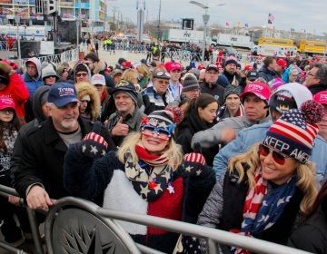 Helena Mantovani (center) of Chester County makes it to her fourth Trump rally at the Wildwoods Convention Center. (Emma Lee/WHYY)