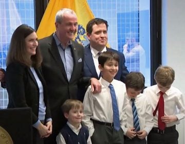 Kevin Walsh and his family with Gov. Phil Murphy on Thursday. (NJTV News)