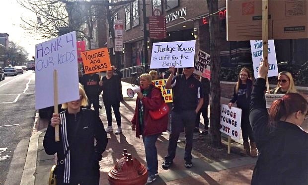 Protesters gather at the corner of 4th and Market streets in Center City to rally against Philadelphia Family Court Judge Lyris F. Younge. (P.J. D’Annunzio/The Legal Intelligencer)
