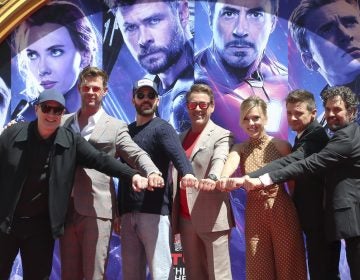 (From left) Marvel Studios President Kevin Feige, Chris Hemsworth, Chris Evans, Robert Downey Jr., Scarlett Johansson, Jeremy Renner and Mark Ruffalo, members of the cast of Avengers: Endgame in Los Angeles in April. The Marvel Cinematic Universe is getting a trans character, Feige says. (Willy Sanjuan/Willy Sanjuan/Invision/AP)