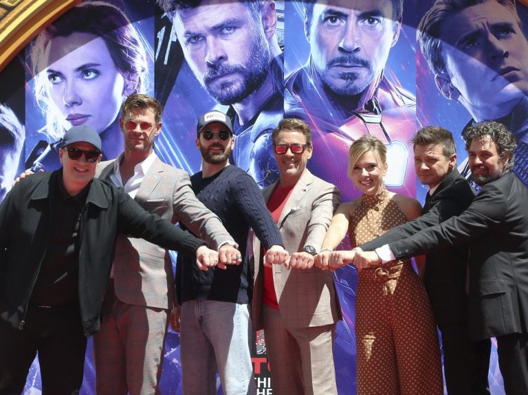 (From left) Marvel Studios President Kevin Feige, Chris Hemsworth, Chris Evans, Robert Downey Jr., Scarlett Johansson, Jeremy Renner and Mark Ruffalo, members of the cast of Avengers: Endgame in Los Angeles in April. The Marvel Cinematic Universe is getting a trans character, Feige says. (Willy Sanjuan/Willy Sanjuan/Invision/AP)