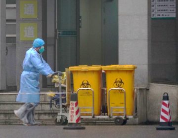 As more cases continue to be confirmed, health officials and medical works in Wuhan, China, and throughout the country ramp up efforts to contain the spread. (Dake Kang/AP Photo)