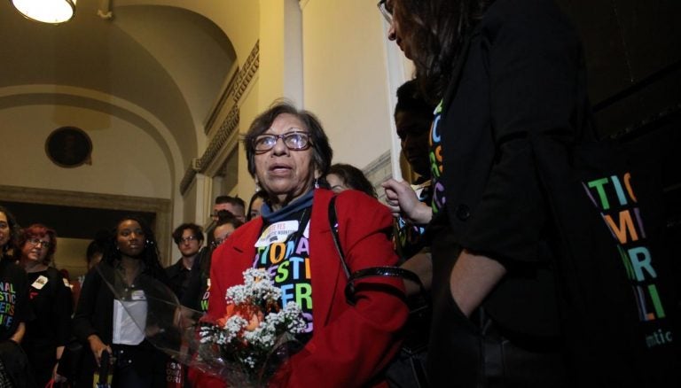 Mercedes, a domestic worker and member of the Pennsylvania Domestic Workers Alliance, speaks to reporters outside of the City Council chambers on Oct. 31 following the Law and Government Committee's passage of the Philadelphia Domestic Worker Bill of Rights. (Emily Neil/AL DÍA News)