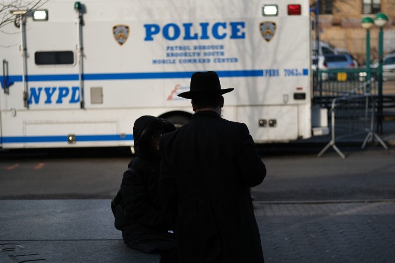 People walk through the Orthodox Jewish section of a Brooklyn neighborhood last month. Tensions remain high in Jewish communities following a series of attacks and incidents in recent weeks. (Spencer Platt/Getty Images)