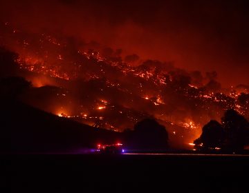 Firefighters conduct property protection patrols at the Dunn Road Fire on Friday in Mount Adrah, Australia. (Sam Mooy/Getty Images)