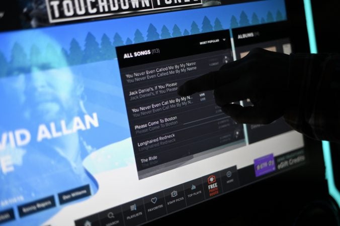 The touchscreen of a jukebox at Deer Lake & West Brunswick Fire Company No. 1. featuring the music of David Allan Coe. (Bas Slabbers for Keystone Crossroads)