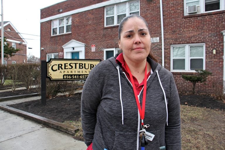 Janella Pascal is moving out of Crestbury Apartments. She has complained about sewage bubbling up in the courtyard near her unit, but 'they don't do anything.' (Emma Lee/WHYY)