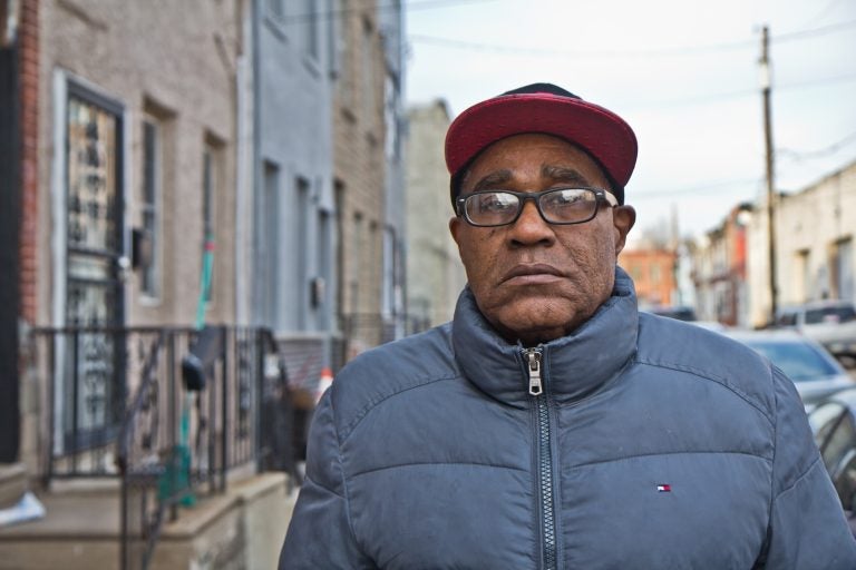 Rodney Everett, 61, takes a walk in his Grays Ferry neighborhood. He is worried that living near the former Philadelphia Energy Solutions refinery may make him sick. (Kimberly Paynter/WHYY)