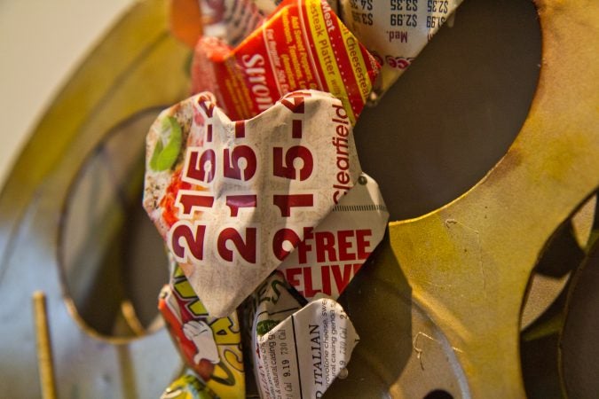 A Trashed Heart valentine made with take-out menus by Beth Zaccagni. (Kimberly Paynter/WHYY)