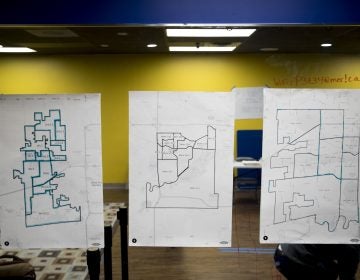 Maps are displayed on the wall of a campaign office for Democratic presidential candidate former South Bend, Ind., Mayor Pete Buttigieg on the day of the Iowa Caucus, Monday, Feb. 3, 2020, in West Des Moines, Iowa. (AP Photo/Andrew Harnik)