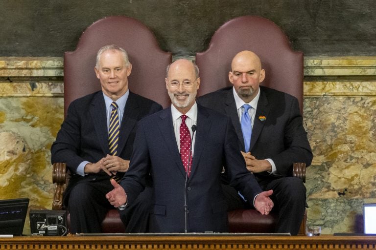 Pennsylvania Gov. Tom Wolf delivers his 2020-21 budget address in the House of Representatives as Speaker Mike Turzai, left, and Lt. Gov. John Fetterman look on, Tuesday, Feb. 4, 2020, in Harrisburg, Pa. (Joe Hermitt/PennLive/The Patriot-News via AP)