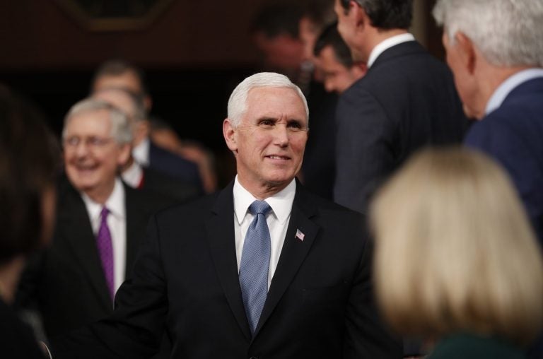 Vice President Mike Pence, center, arrives with Senate Majority Leader Mitch McConnell of Ky., left, before President Donald Trump arrives to deliver his State of the Union address to a joint session of Congress in the House Chamber on Capitol Hill in Washington, Tuesday, Feb. 4, 2020.  (Leah Millis/Pool via AP)