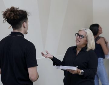 In this Oct. 1, 2019, photo, Gory Rodriguez, of Starbucks, right, interviews a job applicant during a job fair at Dolphin Mall in Miami. On Wednesday, Jan. 8, 2020 payroll processor ADP reports on how many jobs its survey estimates U.S. companies added in December. (Lynne Sladky/AP Photo)