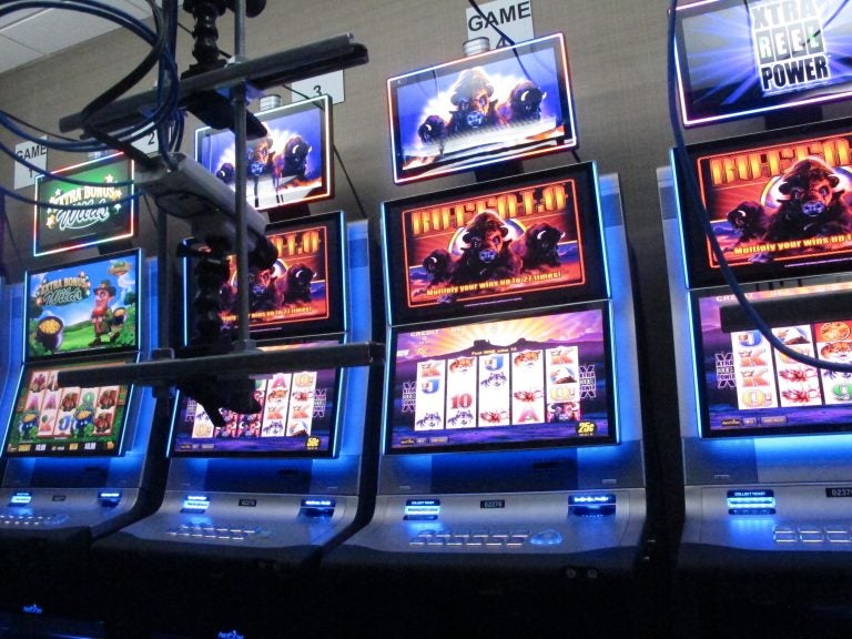 Slot machines in a secure room at the Hard Rock casino in Atlantic City N.J. that have been connected to the internet as part of a new product offering. The technology lets people use the internet to gamble on real-life slot machines that are inside the casino. (Wayne Parry/ AP Photo)