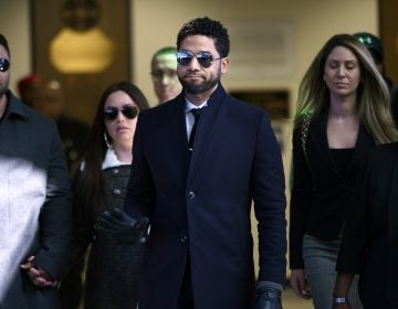 In this March 26, 2019 file photo, actor Jussie Smollett gestures as he leaves Cook County Court after his charges were dropped in Chicago. (Paul Beaty/AP Photo)