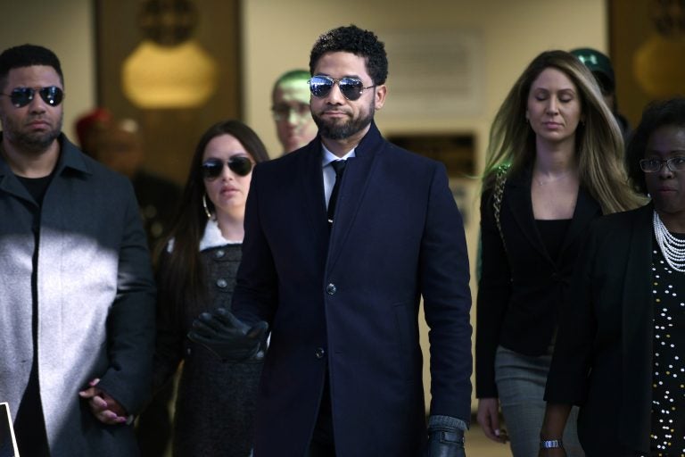 In this March 26, 2019 file photo, actor Jussie Smollett gestures as he leaves Cook County Court after his charges were dropped in Chicago. (Paul Beaty/AP Photo)