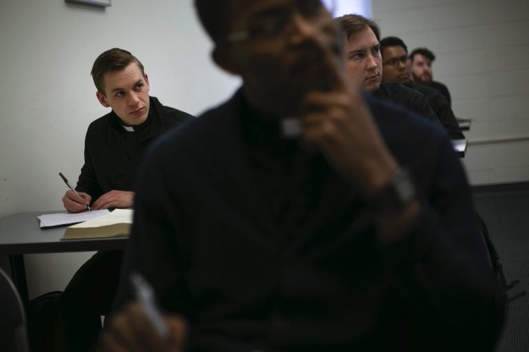 Seminarian Daniel Rice, left, sits with classmates during a lesson on the Gospel of Luke at St. Charles Borromeo Seminary in Wynnewood, Pa. (Wong Maye-E/AP Photo)