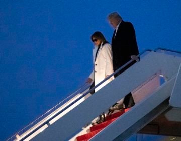 President Donald Trump, and first lady Melania Trump, step off Air Force One upon arrival, Wednesday, Feb. 26, 2020, at Andrews Air Force Base, Md. Trump is returning from India.  (AP Photo/Alex Brandon)