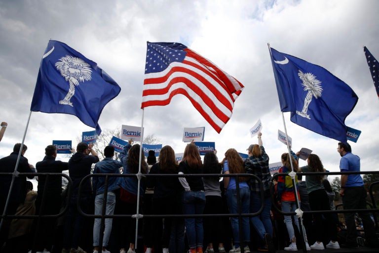 Attendees listen to Democratic presidential candidate Sen. Bernie Sanders, I-Vt., speak during a campaign event, Friday, Feb. 28, 2020, in Columbia, S.C. (AP Photo/Matt Rourke)