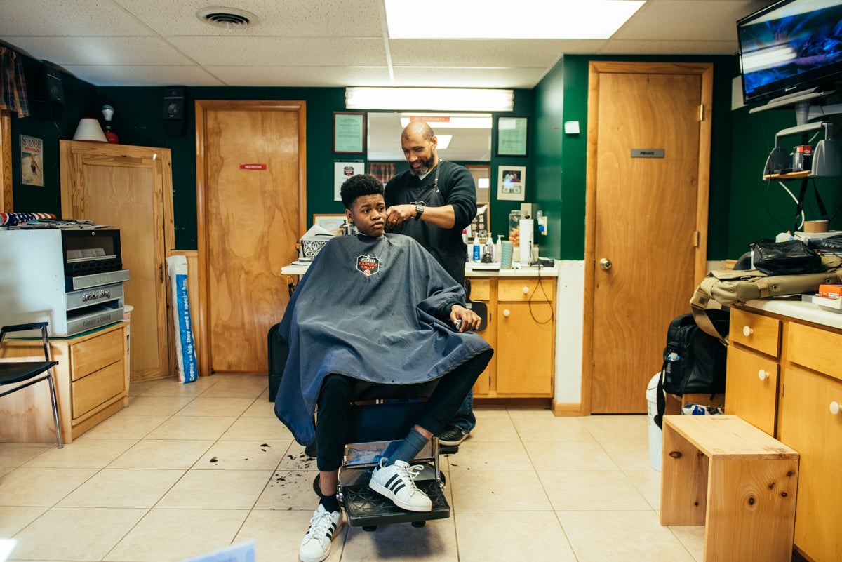  Stephen Fugate, 16, gets a trim at Walker's Barber Shop in Chambersburg, Pa. (Dani Fresh for Keystone Crossroads)
