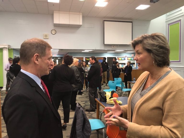 Matt Denn discusses how to influence fellow legislators with first-term Sen. Laura Sturgeon. (Cris Barrish/WHYY)