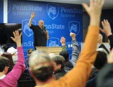 Pennsylvania Lt. Gov. John Fetterman asks for a show of hands with all in favor of adult recreational use marijuana at the conclusion of a listening session on recreational marijuana with community members Mar. 2, 2019, at Penn State Scranton in Dunmore, Pennsylvania. (Matt Smith for WHYY)