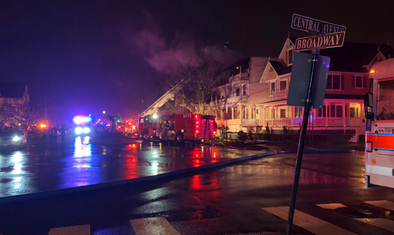 Firefighters work at the scene of a multi-alarm fire in the Ocean Grove section of Monmouth County's Neptune Township early Thursday morning. (Neptune Township OEM/Twitter)