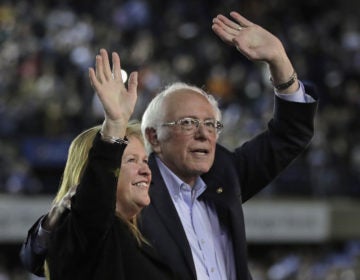 Democratic presidential candidate Sen. Bernie Sanders, I-Vt., waves with his wife, Jane, after his speech at a campaign event in Tacoma, Wash., on Feb. 17. (Drew Angerer/Getty Images)